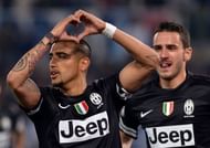 Juventus' Arturo Vidal (L) celebrates after scoring at Rome's Olympic stadium on April 15, 2013